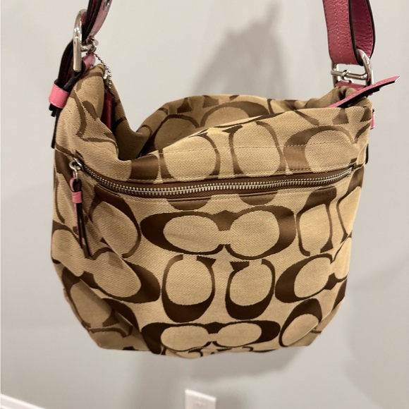 Coach Handbags - Coach Tan Signature Canvas Shoulder Bag with Pink Trim